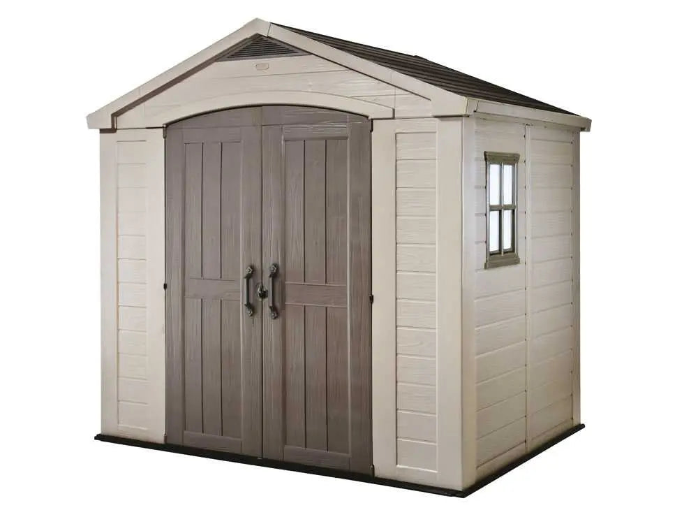 Abri de jardin Keter Factor beige 256,5x182x243 cm en résine robuste avec fenêtre, ventilation et plancher. Spacieux, sans entretien et résistant aux intempéries, idéal pour stocker outils et mobilier de jardin.