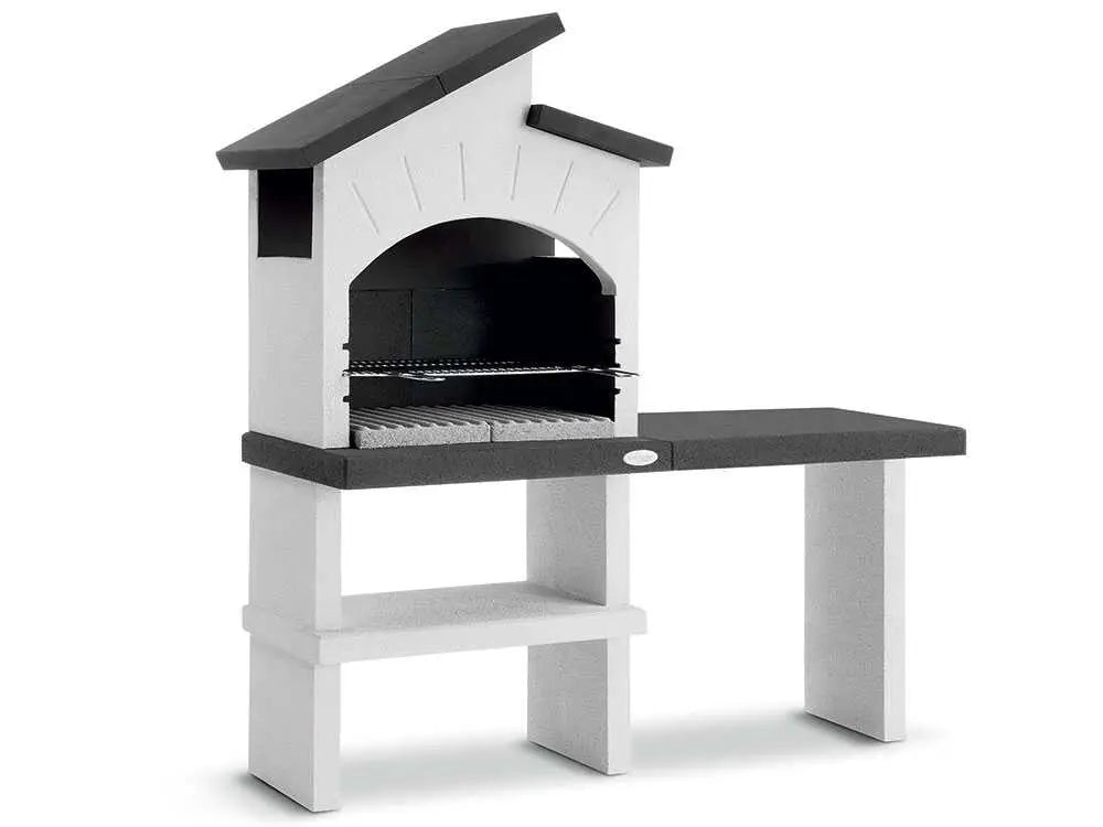 Barbecue à bois et charbon Palazzetti Ravello en ciment réfractaire avec grille réglable 68 x 40 cm, espaces de rangement et finitions Marmotech. Idéal pour 10 à 14 personnes.