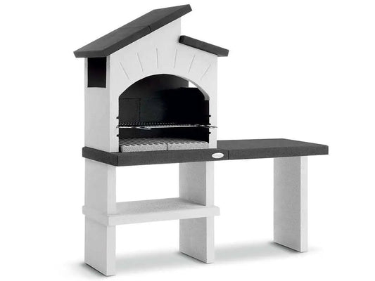 Barbecue à bois et charbon Palazzetti Ravello en ciment réfractaire avec grille réglable 68 x 40 cm, espaces de rangement et finitions Marmotech. Idéal pour 10 à 14 personnes.
