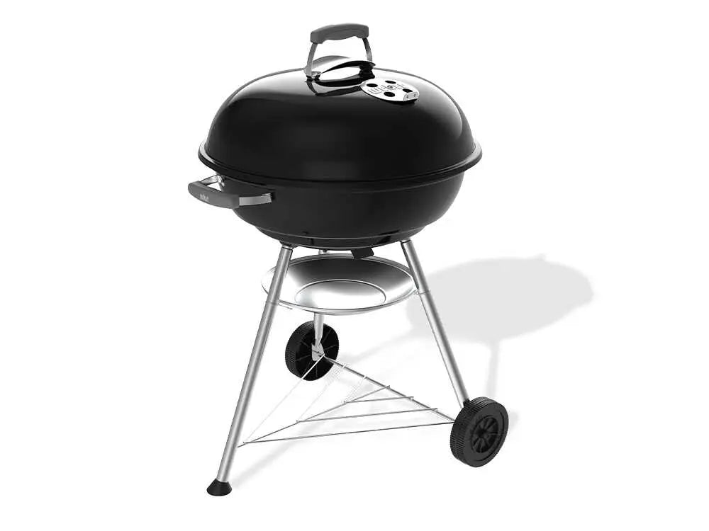 Barbecue à charbon Weber Compact Kettle 57 cm avec couvercle, cuisson homogène et ventilation réglable. Idéal pour grillades familiales jusqu’à 11 personnes avec cuisson directe et indirecte.